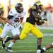 Michigan running back Fitzgerald Toussaint runs the ball in the third quarter at Michigan Stadium on Saturday. Melanie Maxwell I AnnArbor.com